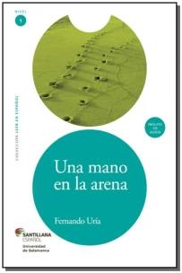 Una mano en la arena